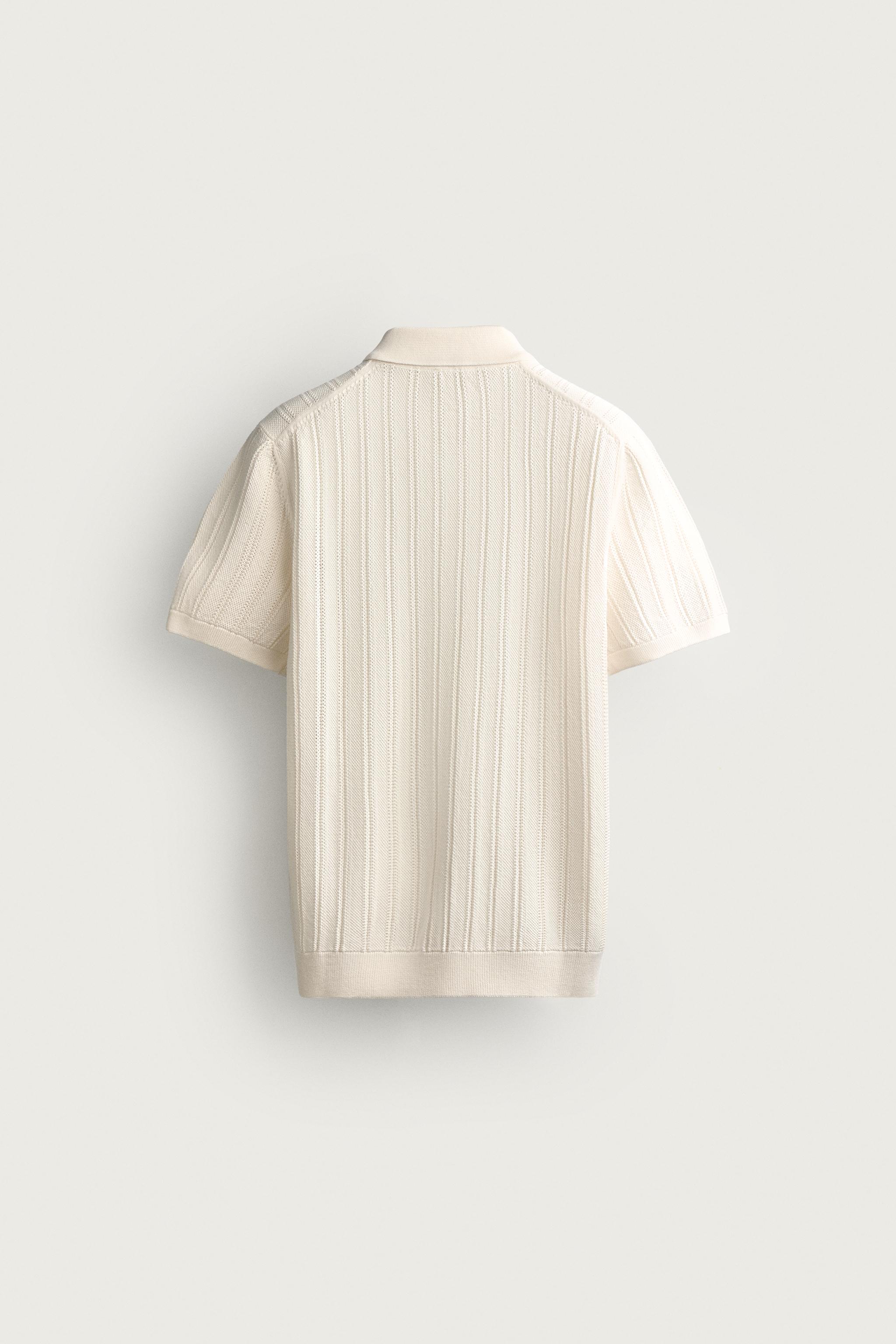 POLO EN MAILLE STRUCTURÉE AJOURÉE